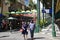 People walking across the main alley of Caudan Waterfront in Mauritius. The city is the country`s economic, cultural, political ce