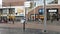 People walking across the street towards the cinema IMAX multiplex PATHE at hague centru