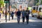 People walking ahead of an Extinction Rebellion protest march, London