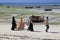 People walking along the beach, Nungwi, Zanzibar, Tanzania