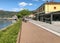 People walking along the Luino, lakefront on the coast of Lake Maggiore, Italy