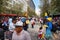 People walking on Amazonas Avenue admiring the `Anos Viejos` festival. The festival is a tradition that takes place every year to