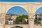 People walking on the aqueduct in historic city Teruel