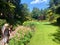 People walking around admiring the beautiful sights and smells of endless gardens at Butchart Gardens, in Brentwood Bay