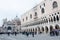 People walking around the Doge`s Palace and San Marco Basilica, Venice, Italy