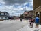 People walking around the nearly empty Universal Studios  in Orlando, Florida while wearing face masks and social distancing