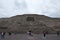 People walking around the ruins at the city of Teotihuacan Pyramids