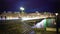 People walking on bridge across Geneva lake, festive illumination, holidays