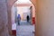 People walking in clay town of Ait Ben Haddou, Morocco