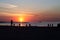 People walking on the coast of the Gulf of Finland