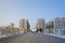 People walking cross the bridge in a sunny day afternoon