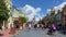 People walking down Main Street USA