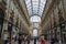 People walking at famous shopping centres the Galleria Vittorio Emanuele II. Milan, Italy