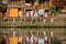 People walking in front of Fenghuang Old Town homes