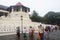 People walking in front of the Temple of the Tooth