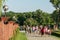 People Walking In Herastrau Public Park