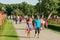 People Walking In Herastrau Public Park