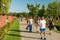 People Walking In Herastrau Public Park