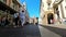 People walking through the historic center