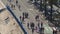 People walking and jogging along Nice seaside beach in morning, healthy life