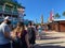 People walking in a long line to the entrance to Islands of Adventure at Universal Studios