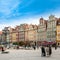 People walking on Main Market Square in Wroclaw.