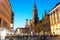 People walking at Marienplatz square and Munich city hall in night in Munich, Germany. Cafes, bars, shops and restaurants. Motion