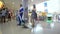 People walking in Modern indoor shopping mall stalls. tracking shot