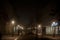 People walking at night during a cold autumn evening on the pedestrian street of Korzo, main avenue of center of Subotica