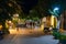 People walking at night street of Paleochora town on Crete island, Greece