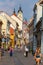 People walking on the old street in city PECS, HUNGARY - SEPTEMBER 18, 2016