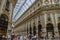 People walking at one of the World largest shopping centres the Galleria Vittorio Emanuele II. Milan, Italy