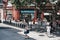 People walking outside Gloucester Road Underground Station, London, UK