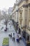 People walking outside Melbourne Town Hall in Melbourne in winter