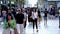 People walking over Champs-Elysee Avenue in Paris - CITY OF PARIS, FRANCE - SEPTEMBER 04, 2023