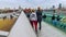 People walking over Millennium bridge