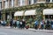 People walking past Gloria, Italian restaurant in Shoreditch, London, UK