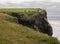 People walking on path along the Cliffs of Mohr