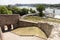 People walking on a pedestrian bridge that connects Kalemegdan fortress with promenade on the river Sava in Belgrade, Serbia