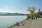 People walking on promenade next to Lake Lucerne in Luzern, Switzerland