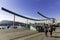 People walking on Rambla de Mar bridge in Barcelona