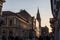 People walking and sitting on the pedestrian street of Korzo, the main avenue of the center of Subotica with the Gradska kuca