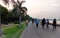 People walking in social distancing amidst COVID 19 pandemic in Sukhna lake premises Chandigarh India