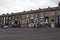 People walking on southbrook terrace ongreat horton road in bradford a run down street of mixed housing and businesses