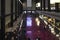 People walking or standing on the floor in the Turbine Hall of the Tate Modern Art Gallery in London