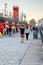 People walking on the street in front of the prefabricated shops in old port Montreal, Quebec, Canada