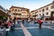 People walking by the streets of the famous Old Town of Sirmione city located on peninsula of Garda lake in Italy. Square full of