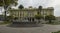 People walking in Sucre Park next to Maldonado National School in the city of Riobamba