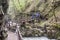 People walking at Vintagr gorge - Slovenia