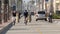 People walking, waterfront promenade beachfront boardwalk. Ocean beach near Los Angeles, California USA